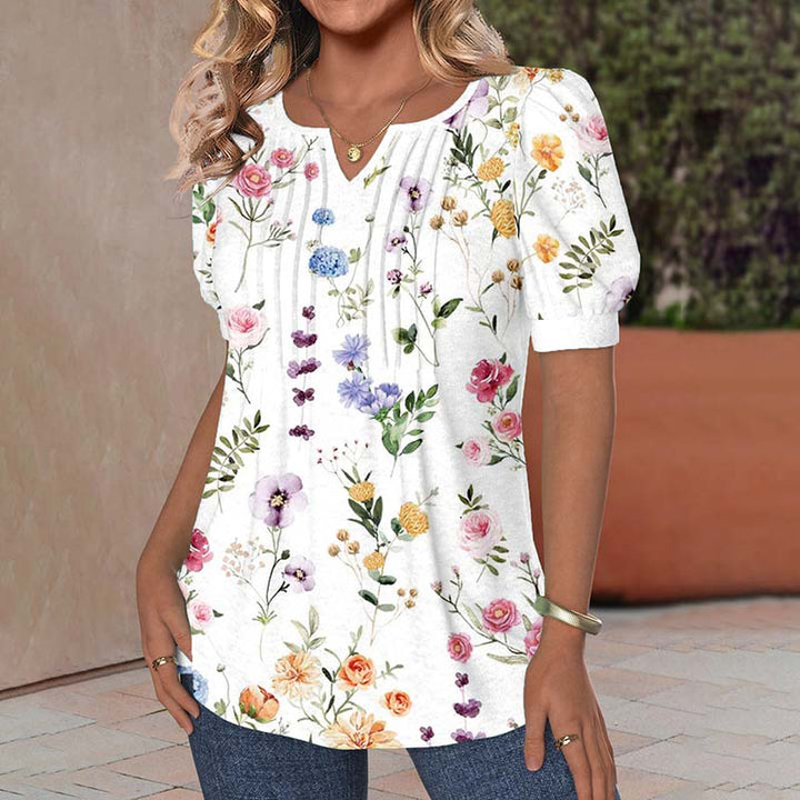 Blusa elegante con estampado floral